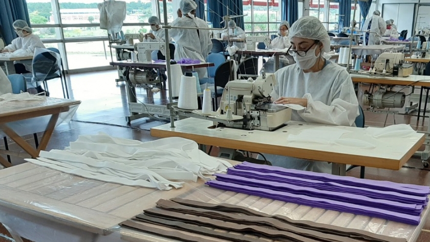 Industria textil para protección sanitaria y envasado de alcohol para asepsia